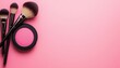 © Wimon - Feminine beauty essentials featuring a delicate pink blush compact and fluffy makeup brushes, exuding sophistication and elegance., copy space for text - trend feminine girly