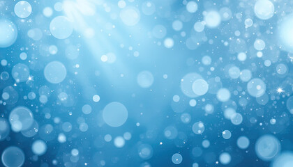 an abstract image of light blue bokeh with white highlights.