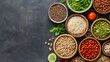 © artzone - Assorted Grains And Legumes In Wooden Bowls On Dark Stone Background