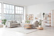 © Pixel-Shot - Interior of light living room with grey sofas, shelf units and window