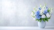 © Giman - Light blue and white floral arrangement in a vase