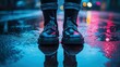 © arsyi_06 - Boots reflected in wet city street, colorful blurry lights in background