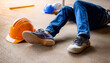 © UNeed - male construction worker laying on floor on accident at construction site