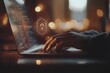 © Muhammad - Person using a laptop with coding elements and a digital lock symbol in a cozy, illuminated setting
