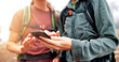 © peopleimages.com - Hands, hiking and people with cellphone, direction or lost with navigation, journey or hobby. Closeup, outdoor or friends with smartphone, internet or digital app for online guide, mountain or travel
