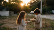 © pattozher - Sharing Meal Together: Two young children, bathed in the warm glow of the setting sun, share a meal, fostering a sense of togetherness and familial bond.