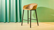 © kanjana - Modern Tan and Black Bar Stool on Green Background