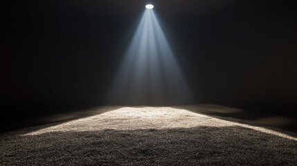 Poster - Spotlight illuminating a textured surface in the dark.