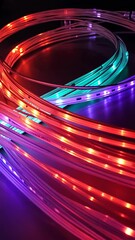 Wall Mural - glowing led flexible light strips forming circular and linear shapes with red, green, and purple lig