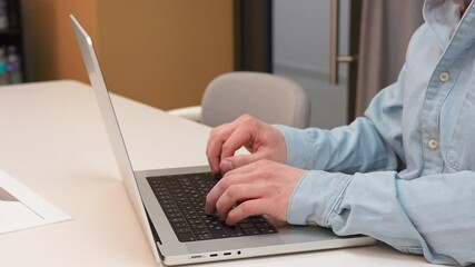 Canvas Print - fingers on a laptop keyboard close-up, code development concept, typing on a keyboard.