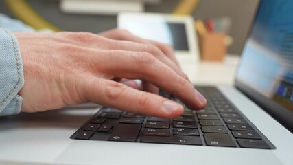 Canvas Print - fingers on a laptop keyboard close-up, code development concept, typing on a keyboard.