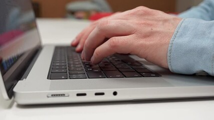 Canvas Print - fingers on a laptop keyboard close-up, code development concept, typing on a keyboard.