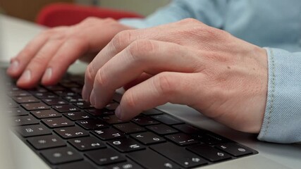 Canvas Print - fingers on a laptop keyboard close-up, code development concept, typing on a keyboard.