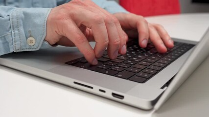 Canvas Print - fingers on a laptop keyboard close-up, code development concept, typing on a keyboard.