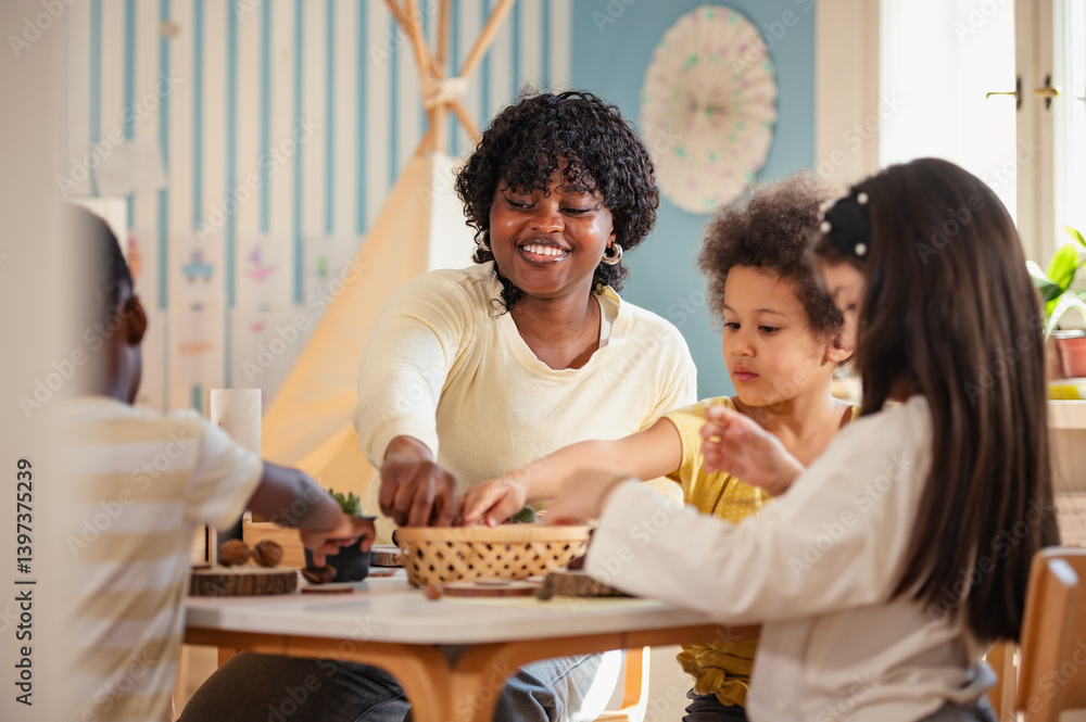 Foto Preschool teacher guides a diverse group of children in a natural ...