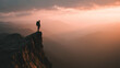 © ABX - Male hiker staring at horizon silhouette on cliff edge