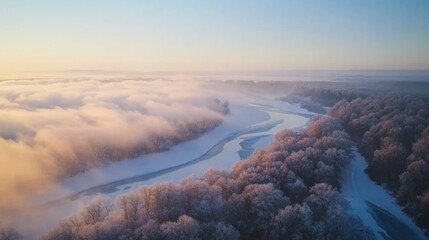 Aufkleber - A winding frozen river snakes through a snow-covered forest with frosted trees, all under a pale blue sky adorned with soft clouds, creating a serene winter landscape