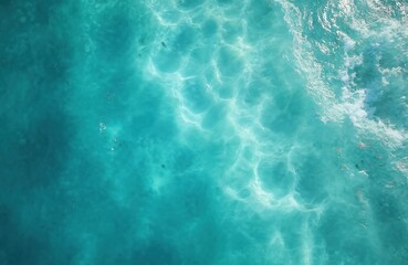 Aufkleber - Aerial top view of clear turquoise ocean water texture. Abstract pattern of waves, bubbles and foam. Ideal for background. Summer vacation mood, tropical resort, travel.