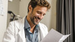 © ABF_MATEO - Smiling doctor reviews patient medical records in well-lit office, conveying trust and reliability in healthcare environment.