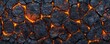 © Johnnii - A close-up view of cracked volcanic rock, featuring glowing orange lava fissures that highlight the intense heat and geological activity beneath the surface.