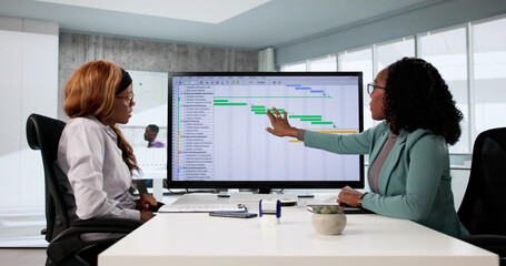 Poster - Skilled African American woman managing data