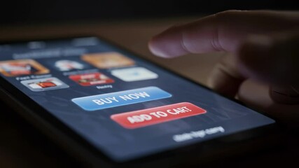 Finger pointing at add to cart button on smartphone screen displaying online store interface, concept of e-commerce, mobile shopping and online retail purchasing decisions online