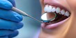 © oksa_studio - Dentist using dental mirror while examining patient's teeth