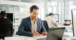 © peopleimages.com - Financial, typing or businessman with laptop for research, economy news or profit evaluation. Budget, finance advisor or economist with information for company revenue growth, payroll or investment