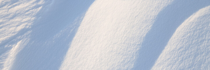 Wall Mural - snow texture. wind sculpted patterns on snow surface. wind in the tundra and in the mountains on the