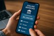 © olegganko - Online Banking Transaction on a Smartphone in a Workspace Environment