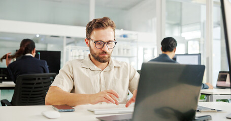 Fototapete - Man, laptop and typing in hospital for research, project management and scientific study. Medical engineer, tech or review in coworking space for healthcare innovation with pharmaceutical development