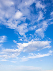 the sky is blue and clear with a few clouds scattered throughout