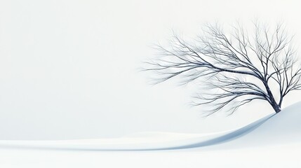 Wall Mural - a solitary tree in a snow-covered field, stripped of leaves on its branches