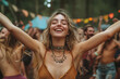 © Midea  - Woman in bikini top dancing at music festival.