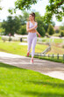 © Eric Hood - Beautiful young woman running jogging in morning