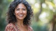 © Harry - Portrait woman smiling curly hair beauty face cheerful person female happy confident attractive outdoors