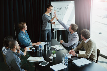 Poster - Team, presentation and high five in boardroom for meeting, business planning and white board demonstration. Presenter, company and goal or idea with strategy, collaboration or professional project