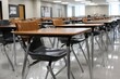 © Marcos Kulenkampff - Classroom desks and chairs arranged in rows, ready for students in a bright and tidy classroom environment. Clean, organized, and orderly setup.