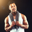 © peopleimages.com - Fitness, portrait and man in studio with towel, confidence and workout routine in health, wellness and power. Relax, pride and strong athlete on black background for exercise, results and muscle