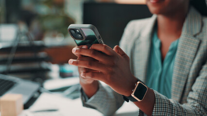 Poster - Phone, hands and black woman in office with contact, social networking or email for business deal. Cellphone, professional and African female financial advisor with online report for investment.