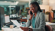 © peopleimages.com - Documents, phone call and smile of business black woman in office for administration or update. Conversation, feedback and review with happy African employee in professional workplace for negotiation