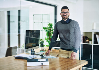 Poster - Desk, computer and portrait of business man in office with company pride, confidence and happy. Creative startup, professional agency and person for career, online project or job in digital marketing