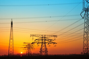 Wall Mural - wire electrical energy at sunset