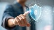 © Kittinan - Cybersecurity Artificial Intelligence Machine Learning concept Digital security concept with a hand touching a virtual shield icon.