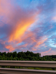 Wall Mural - a beautiful sunset with a pink and orange sky
