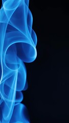 Wall Mural - abstract, flowing blue curves on black background. translucent, ethereal shapes suggest movement, en