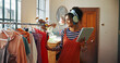 © peopleimages.com - Woman, tablet and headphones for small business, ecommerce and fashion boutique startup with online sales. Designer, technology and website for internet store, retail service and quality control