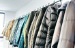 © Katarzyna Ledwoń - Clothing racks in second-hand store – sustainable fashion, vintage style, and conscious shopping