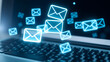 © Sara - Floating email icons above a laptop keyboard, glowing with connectivity