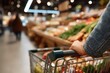 © Miroslav - Customer pushing shopping cart in grocery store with fresh produce